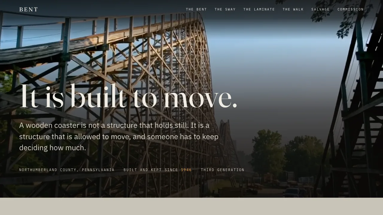 BENT homepage showing a wooden roller coaster structure at first light before the park opens.
